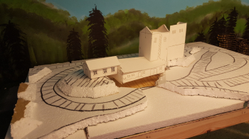 Got a bit further this evening. Started with cutting out the rest foam sheets for the leveling. Level 0 is direct on the plywood there the middle storage building for the smeltery will go. Level 1 is the dam which gives water for the steam engine which...