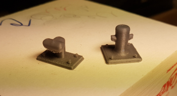 This evening I designed and printed two types of bollards. The winner was the straight up pole kind of guy .. The bent horn type is nice to, but gives hint of a much bigger harbor than I had in mind. These will be painted flat black with a bit seagull sh