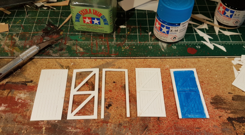 162644  -- from left the 3 pieces making a door, then assembled plus one with first paint on