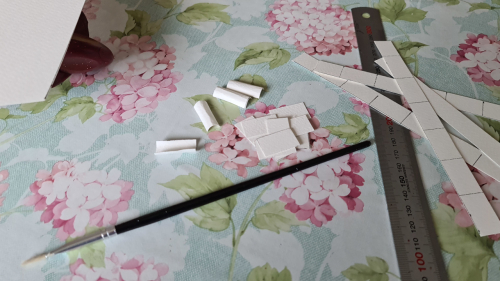 124259  -- The best method so far was to bend a piece of paper around a small brush. When glued on I will have to add an extra 